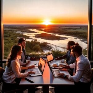 Data consultants collaborating on a report in an office with a setting sun